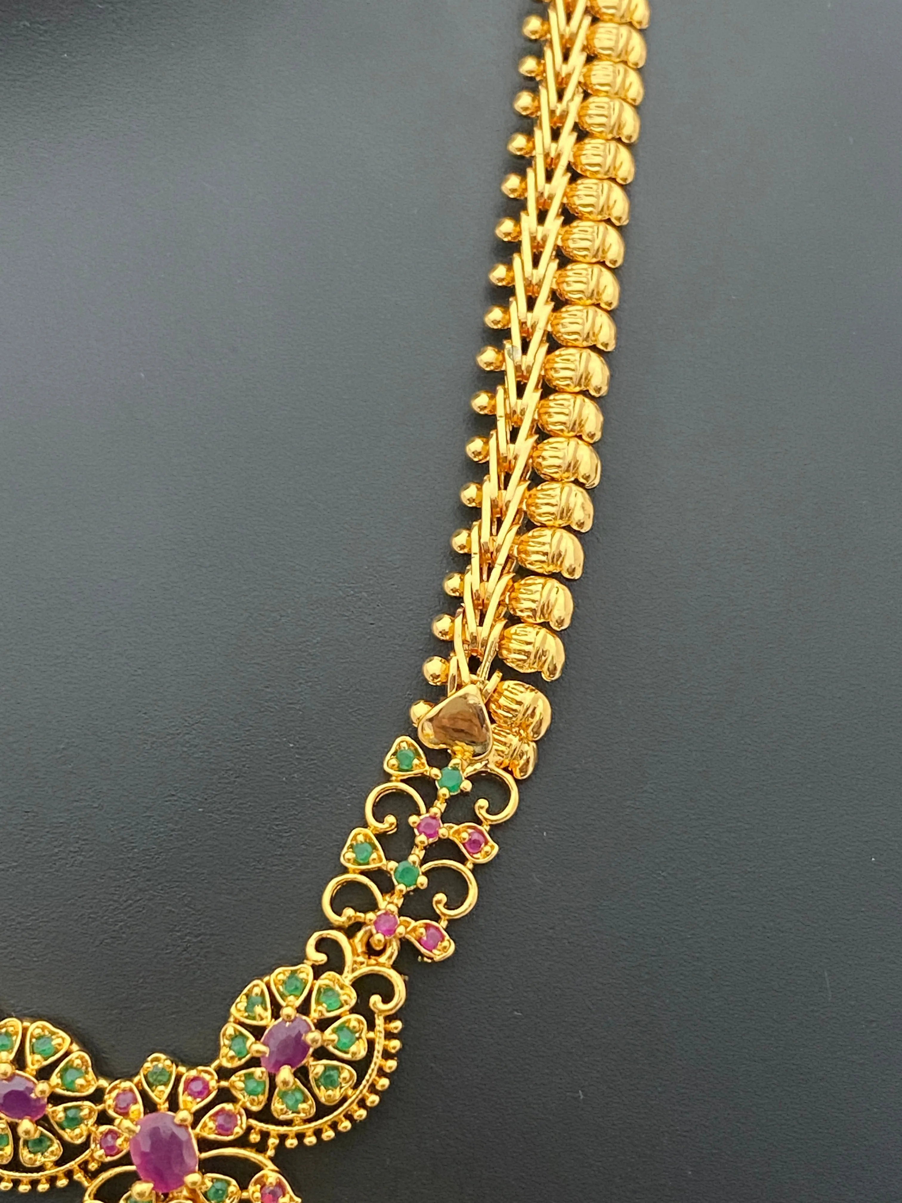 Beautiful Gold Plated Traditional Wear Ruby And Emerald Colored Necklace With Tear Drops