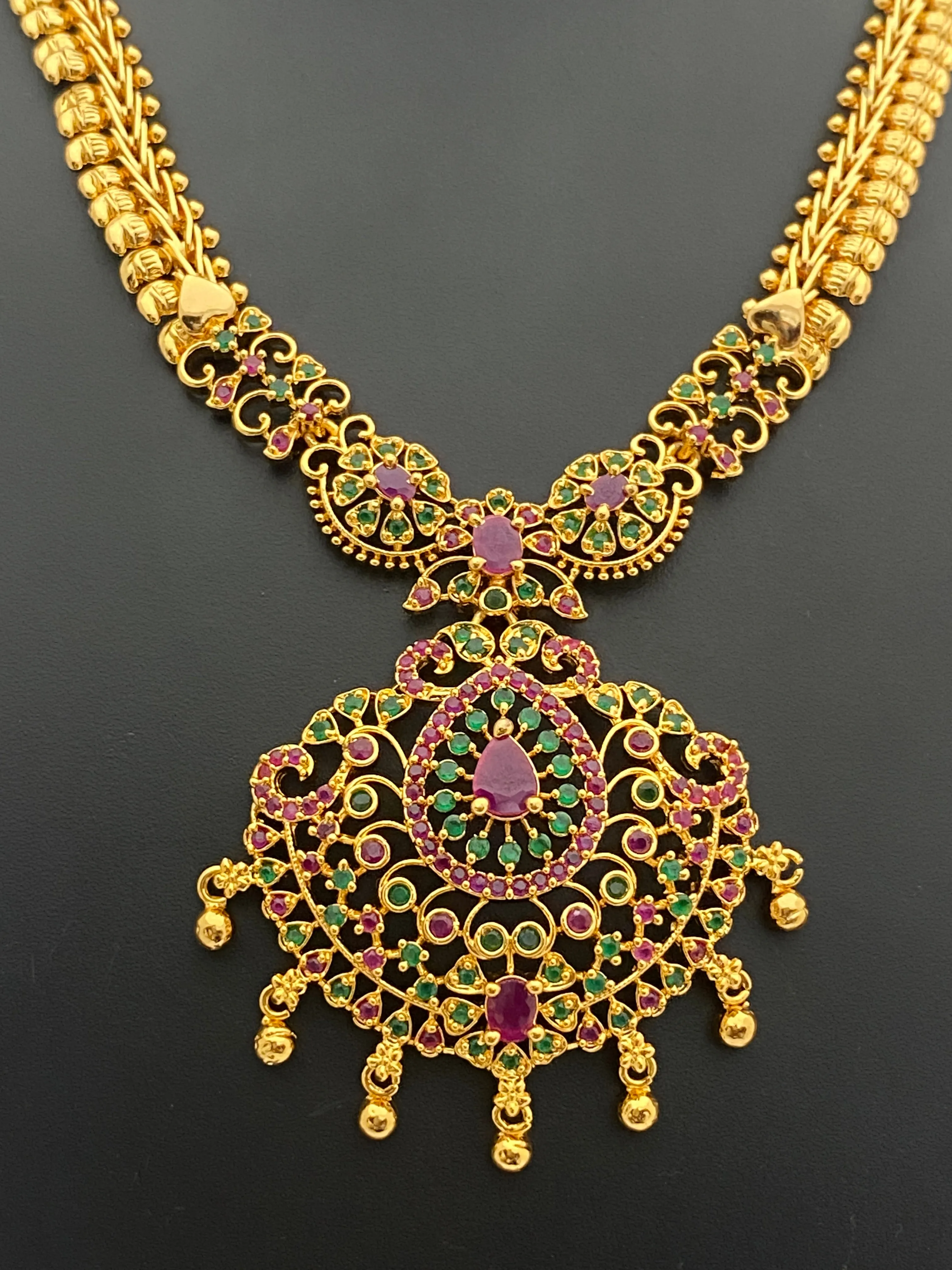 Beautiful Gold Plated Traditional Wear Ruby And Emerald Colored Necklace With Tear Drops