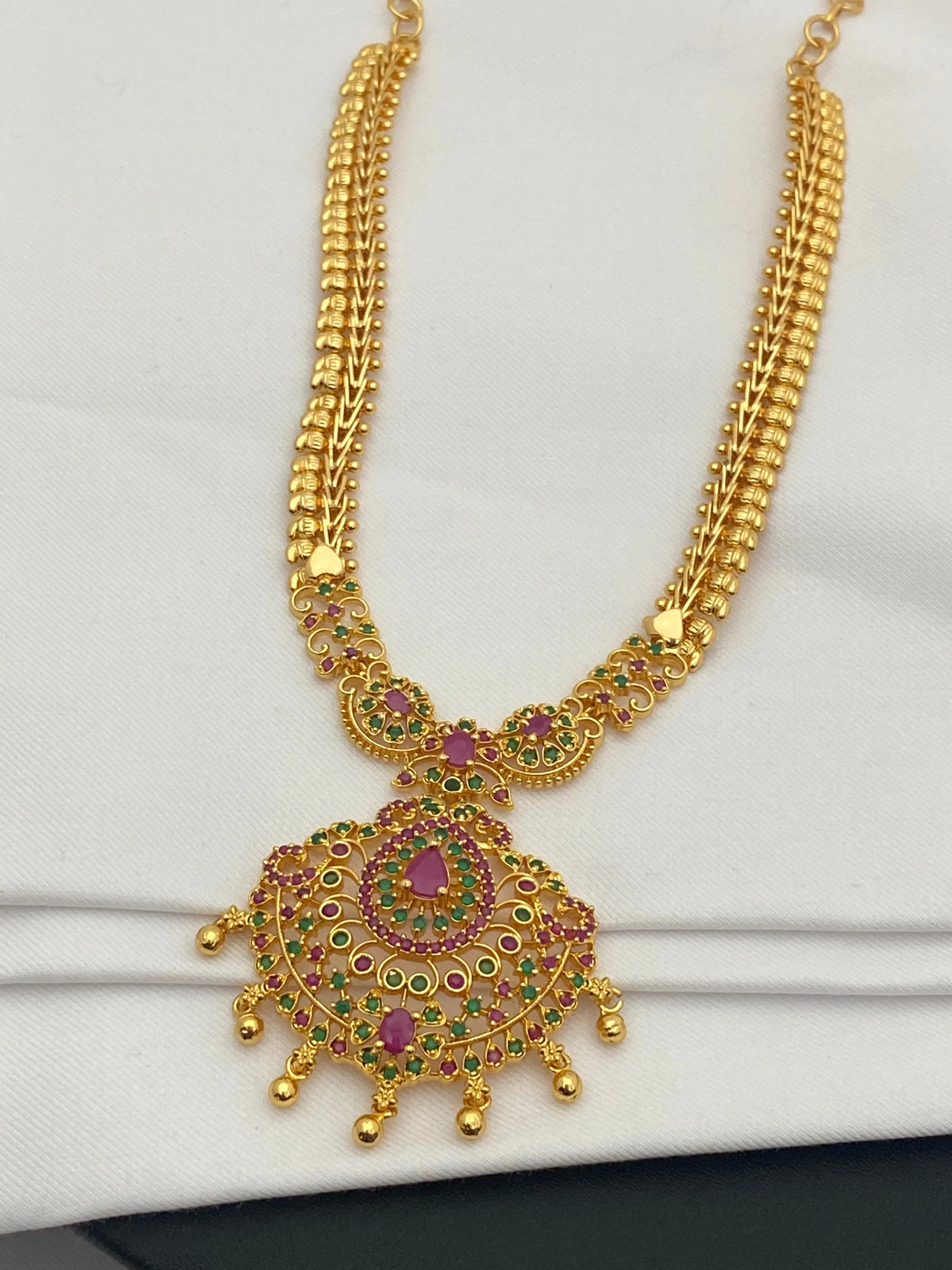 Beautiful Gold Plated Traditional Wear Ruby And Emerald Colored Necklace With Tear Drops