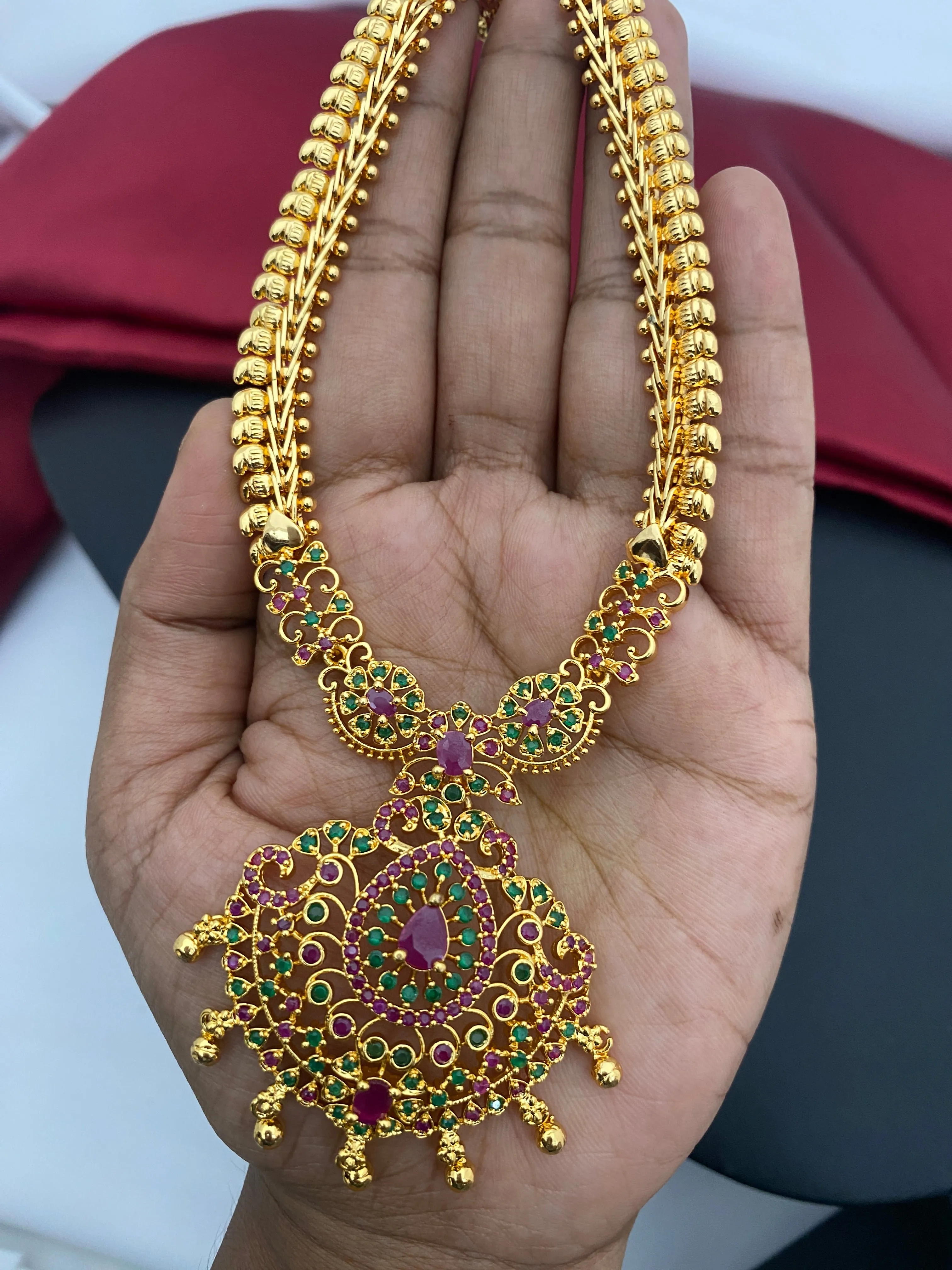 Beautiful Gold Plated Traditional Wear Ruby And Emerald Colored Necklace With Tear Drops